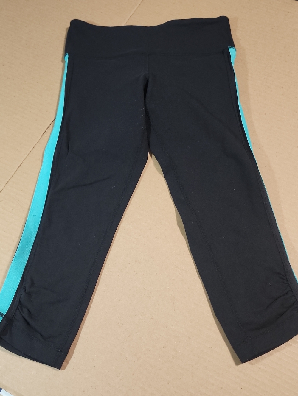 Lululemon Crop Leggings in Black with Turquoise Side Trim, Size 4